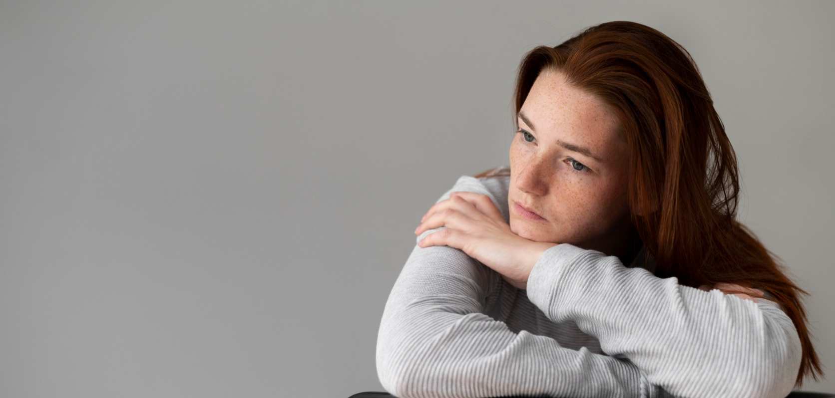 Stressed woman wondering if cannabis good for depression and in need of an online dispensary for mail order marijuana BC cannabis.