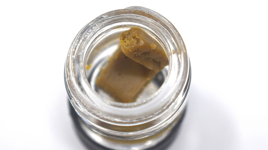budder weed in a glass bowl to answer the question of what is better Budder vs shatter? Buy cannabis concentrates online in Canada from Chronic Farms weed dispensary and mail order marijuana weed store.