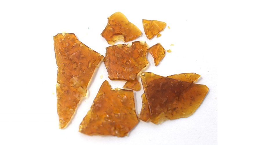 Pieces shatter weed concentrate dab drug for dabs at Chronic Farms online weed dispensary for gummys, concentrates, edibles, and dispensary weed.